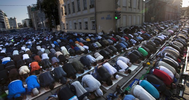 Muslim men, bowing toward Mecca, perform Eid al-Fitr prayers that marks the end of the holy fasting month of Ramadan in Moscow, Russia, Sunday, Aug. 19, 2012. Source: AP