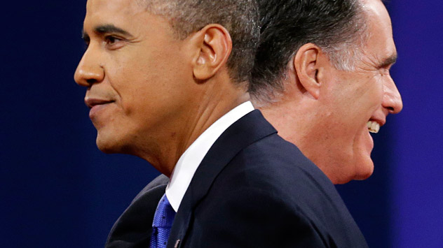 Republican presidential candidate, former Massachusetts Gov. Mitt Romney and President Barack Obama walk past each other on stage at the end of the last debate at Lynn University, Monday, Oct. 22, 2012, in Boca Raton, Fla. Source: AP