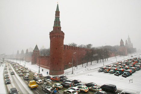 Heavy snow caused traffic jams as snow clearing ploughs are parked near Red Square in Moscow. Source: AP 
