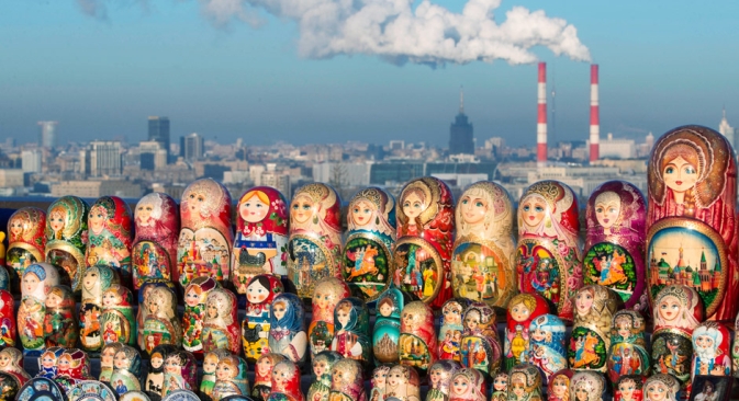 Matryoshkas, traditional Russian wooden dolls, are displayed for sale on a cold winter day in the Sparrow Hills, the site of tourist attraction in Moscow, Wednesday, Dec. 12, 2012. Temperature is about -10 C (14 F). Source: AP