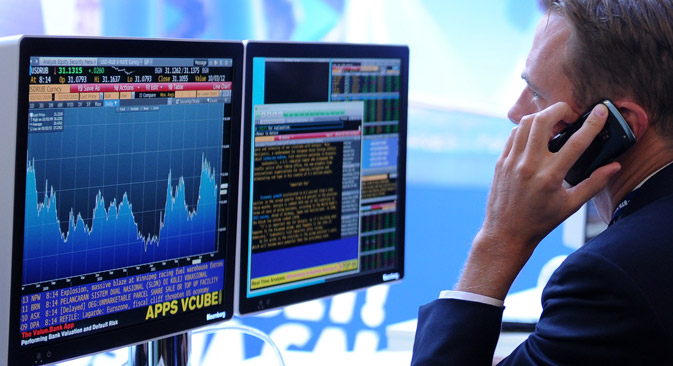 A screen displaying stock exchange graphs and and diagrams at the VTB Capital Fourth Annual Investment Forum "Russia Is Calling!". Source: RIA Novosti / Alexey Filippov