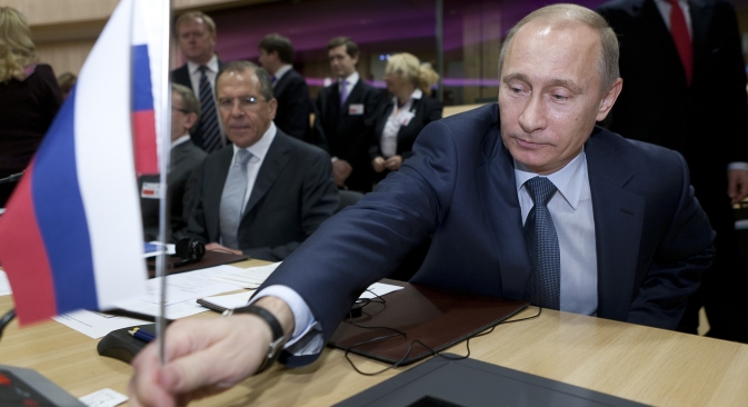 Russian President Vladimir Putin: Russia's weight and influence in the world will increase. Pictured: Vladimir Putin (right) and Russian Foreign Minister Sergei Lavrov (left) during the negotiations with EU. Source: ITAR-TASS