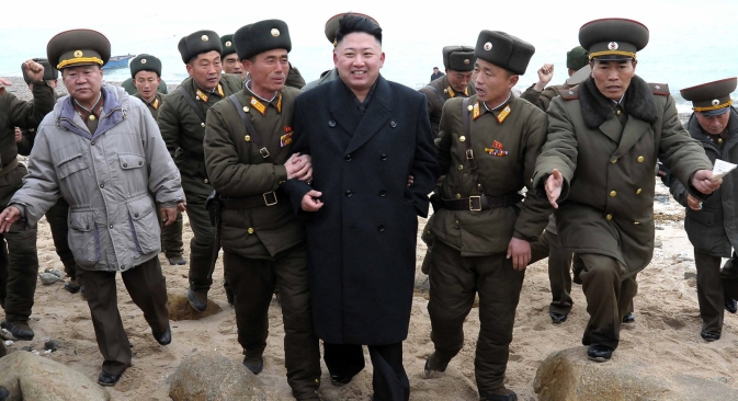 North Korean leader Kim Jong Un, center, walks with military personnel as he arrives for a military unit on Mu Islet, located in the southernmost part of the southwestern sector of North Korea's border with South Korea. Source: AP