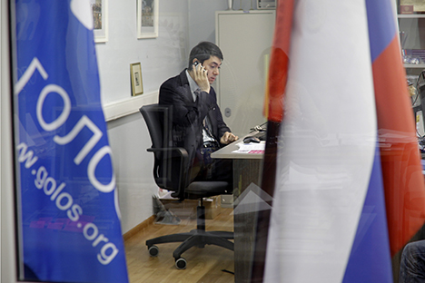 Golos association deputy direcor Grigory Melkonyants has been challenged with the administrative charges from the Ministry of Justice. Source: AP Photo / Ivan Sekretarev