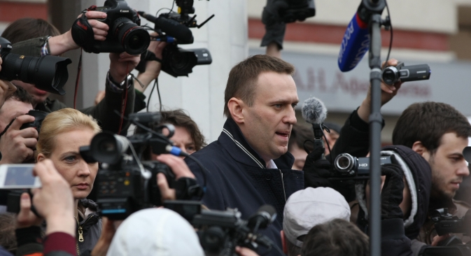 Russian opposition leader Alexey Navalny speaks to journalists after the Kirov court postponed his trial until April 24. Source: RIA Novosti / Maksim Bogodvid