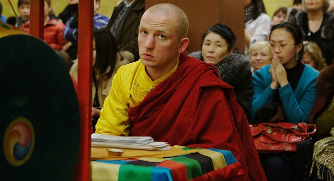 Many ethnic Russians come to Buddhism these days. Pictured: A prayer at the Buddhist temple in St. Petersburg before the rite of "collective sin" burning in a ritual bonfire on the lunar New Year's Eve. Source: RIA Novosti / Alexey Danichev 