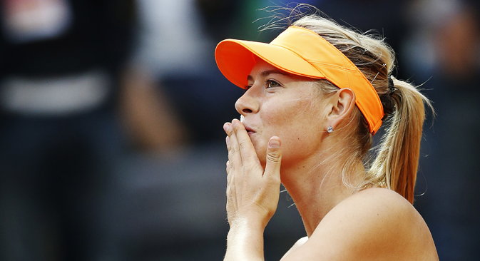 Maria Sharapova blows a kiss to spectators after defeating Garbine Muguruza of Spain in their women's singles match at the Rome Masters tennis tournament on May 15. Source: Reuters