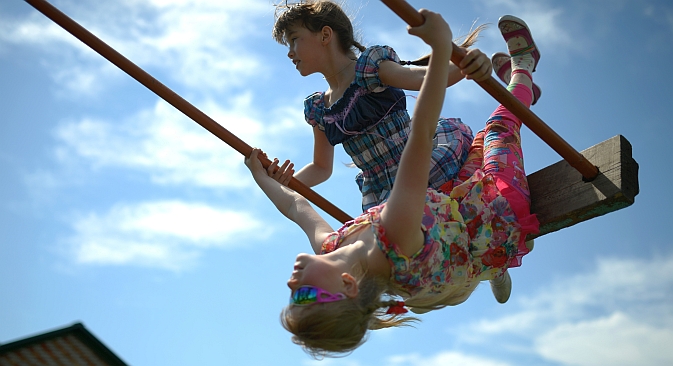 Russian orphans in the yard of a high school in the town of Ivankino, the Novosibirsk Region. Source: RIA Novosti / Alexander Kryazhev 