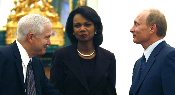 Then-U.S. Secretary of Defense Robert Gates (left) and then-U.S. Secretary of State Condoleezza Rice are greeted by Russian President Vladimir Putin in the Kremlin in 2008. Source: Reuters