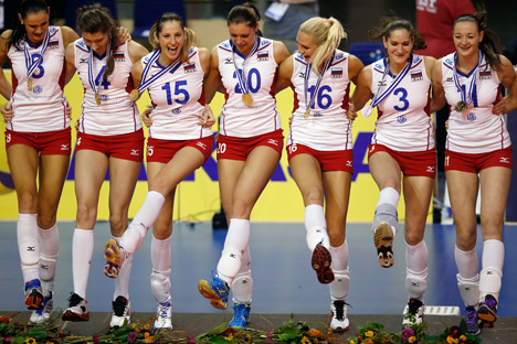 The players of the winning team of Russia dance during the victory ceremony for the Women's Volleyball European Championships in Berlin, Germany, Saturday, Sept. 14, 2013. Source: AP