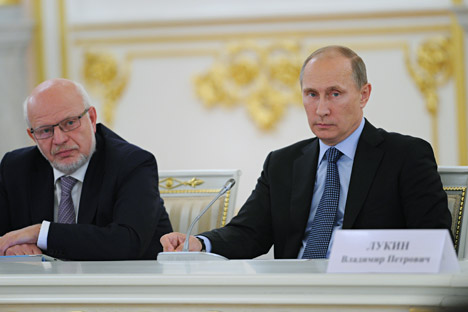 Chairman of Russian Council for Human Rights Mikhail Fedotov (L) and Russian President Vladimir Putin during the meeting of the Council on Civil Society and Human Rights on Sept. 4. Source: ITAR-TASS