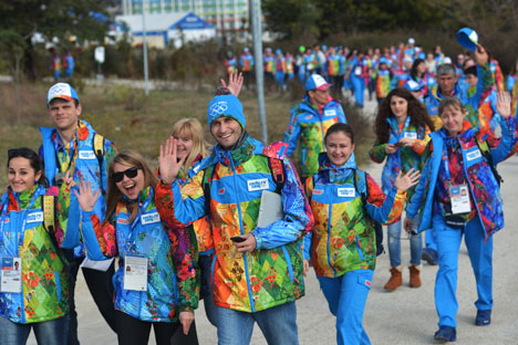 The volunteers are preparing for the Opening Ceremony.  Source: RIA Novosti
