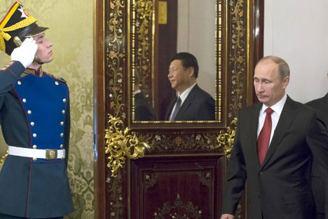 Russia's President Vladimir Putin, right, and his Chinese counterpart Xi Jinping in the Grand Kremlin Palace in Moscow. Source: Reuters