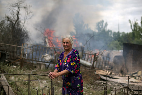 On Wednesday, residential buildings in a village near Lugansk were severely damaged by a massive air strike. Source: Photoshot / Vostock Photo