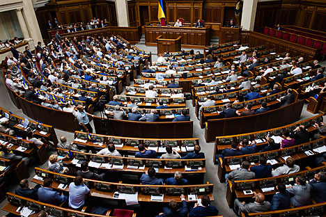 Verkhovna Rada adopted yesterday, in the first reading, a bill that would allow Kiev to impose sanctions against Russia. Source: Photoshot / Vostock-Photo