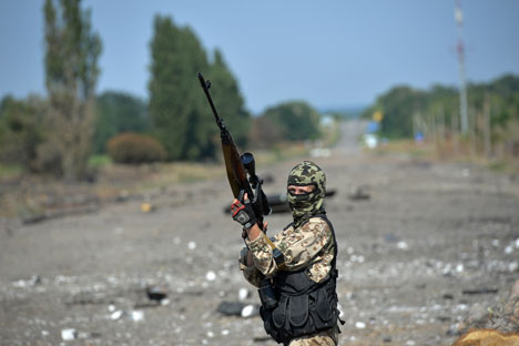 A Lugansk People's Republic militiaman at the Dolzhansky border crossing point. Source: Maxim Blinov / RIA Novosti