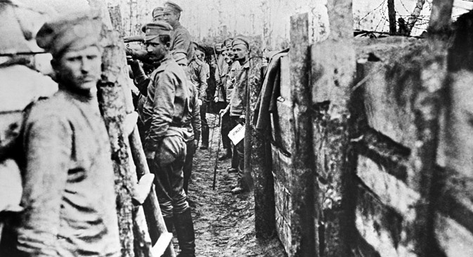 Russian soldiers inside first-line trenches near Panevezis railroad on the Dvina Front. This 1914-1918 photo reproduced by N. Pashin in 1963. Source: RIA Novosti