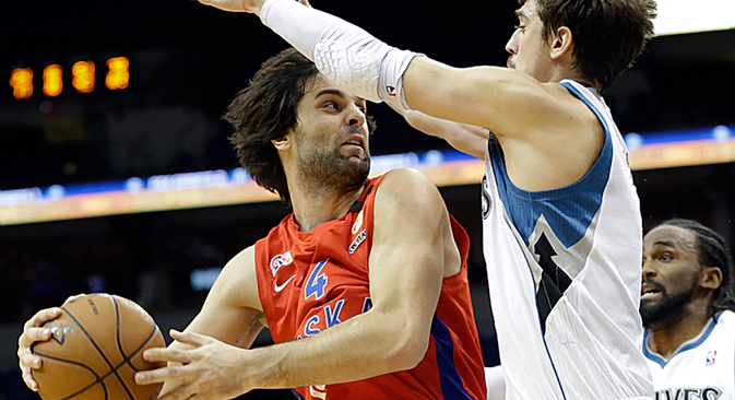  CSKA Moscow's Milos Teodosic, left, looks to pass as he is pressured by Minnesota Timberwolves' Alexey Shved, of Russia, in the second half of a preseason NBA basketball game, Monday, Oct. 7, 2013, in Minneapolis. Source: AP