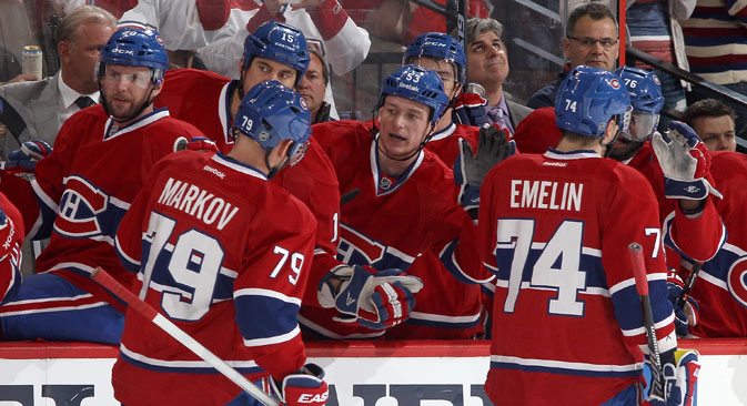 Andrei Markov and Alexei Emelin celebrate their first period goal against the Ottawa Senators with team mates during an NHL game at Canadian Tire Centre on April 4, 2014 in Ottawa, Canada. Source: Getty Images / Fotobank