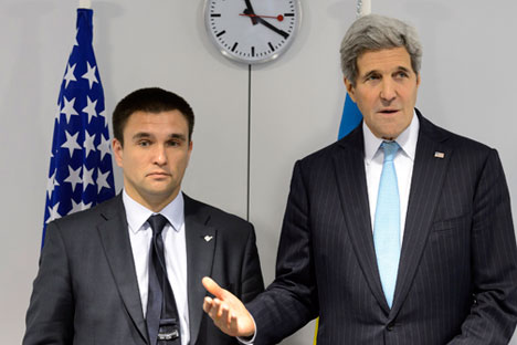 U.S. Secretary of State John Kerry talks to Ukraine's Foreign Minister Pavlo Klimkin at the meeting of foreign ministers from the OSCE in Basel, December 4, 2014. Source: Reuters