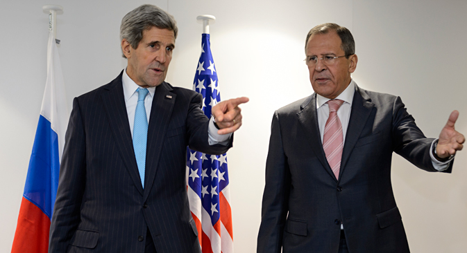 US Secretary of State John Kerry, left, and Russian Foreign Minister Sergey Lavrov gesture prior tp a bilateral on the sidelines of an Organization for Security and Cooperation in Europe (OSCE) ministerial meeting in Basel, Switzerland, Thursday, Dec. 4, 2014. Source: AP