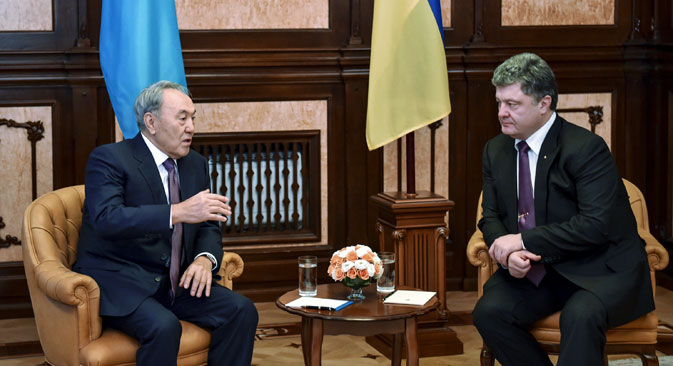 Ukrainian President Petro Poroshenko, right, and Kazakh President Nursultan Nazarbayev during a meeting in Kiev. Source: RIA Novosti / Nikolay Lazarenko