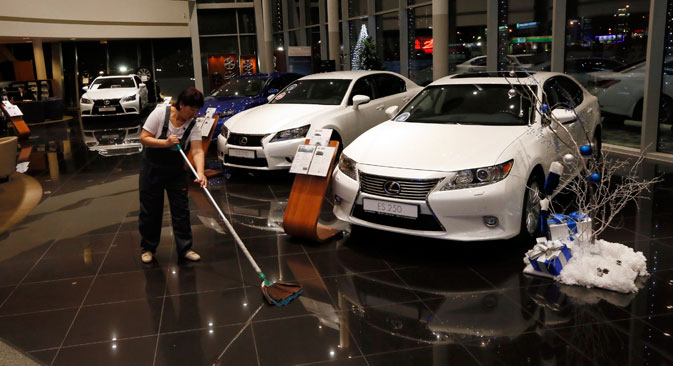 Currency crisis prompts halt in foreign car sales and freeze on new loans. Source: Reuters
