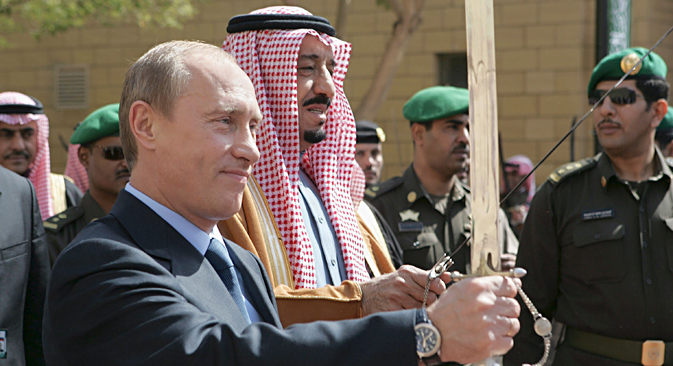 Russian President Vladimir Putin and Prince Salman bin Abdul Aziz, Governor of Riyadh, hold swords on a visit to King Abdul Aziz Historical Centre in Riyadh, 2007. Source: Reuters