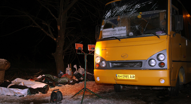 A damaged passenger bus near Volnovakha after it was hit by a shell. Several people were killed. Source: Valentin Sprinchak / TASS