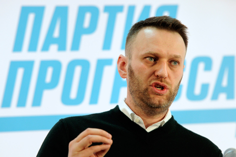 Russian opposition activist and anti-corruption crusader Alexei Navalny addresses his party members in Moscow, Russia, Sunday, Feb. 1, 2015. Letters in Cyrillic at the background read: Party of Progress. Source: AP