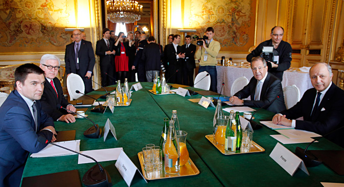 French Foreign Affairs Minister Laurent Fabius (right) with his counterparts from Russia Sergei Lavrov (second right), Germany's Frank-Walter Steinmeier (second left) and Ukraine's Pavlo Klimkin in Paris, on Feb. 24. Source: AP