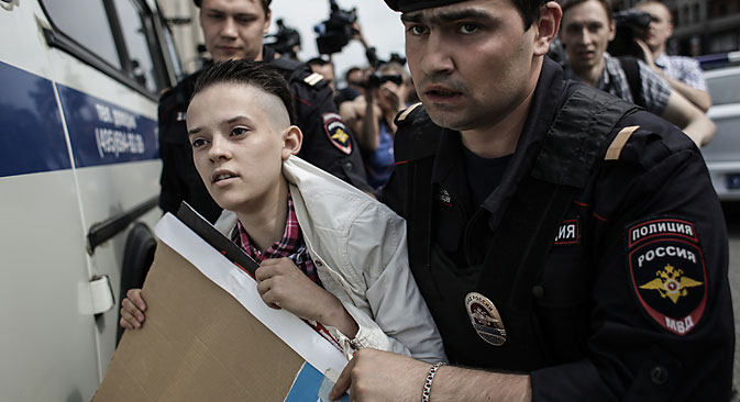 Police apprehend a participant of an unauthorized rally held by gay activists outside the building of the Russian parliament in Moscow, 2013. Source: Andrei Stenin / RIA Novosti