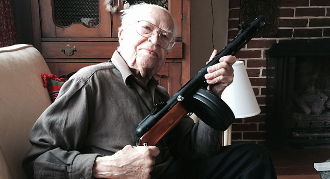 American veteran Belousovich poses with a Shpagin submachine gun. Source: From personal archives