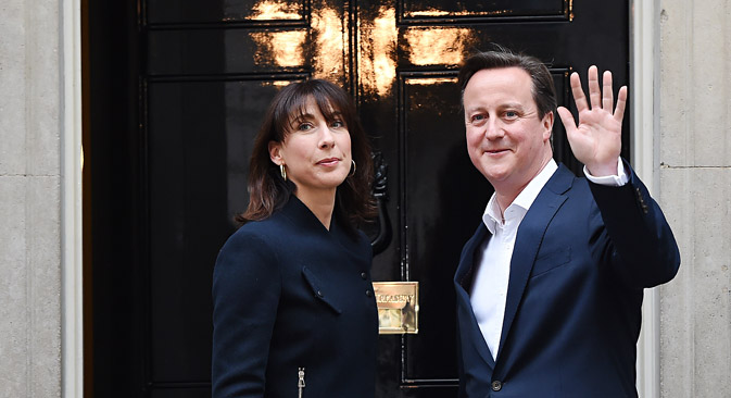 David Cameron, pictured here with his wife Samantha outside No. 10 Downing Street in London, has won a second term as British Prime Minister. Source: EPA