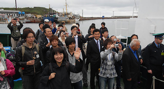 Japanese tourists traveling by ferry to Kunashir, the most populous of the Kuril Islands. Source: Andrey Shapran