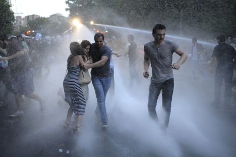  Armenian police use water cannons to disperse protesters demonstrating against an increase in electricity prices in the Armenian capital of Yerevan, Tuesday, June 23, 2015. Source: Narek Aleksanyan/PAN Photo via AP
