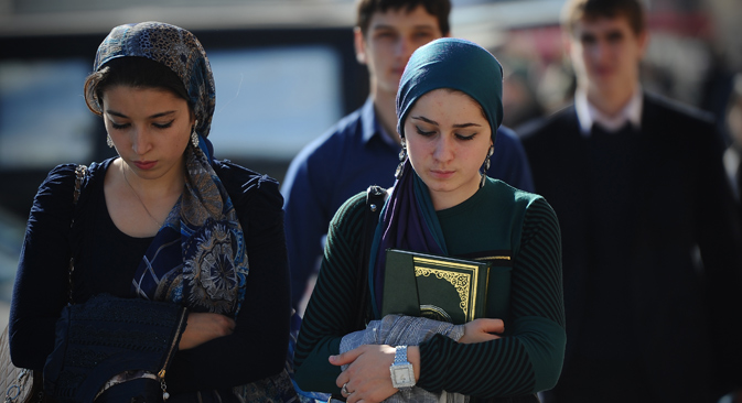 Young women seen near the Berkat market in Grozny, Chechnya, 2012. Source:  Ramil Sitdikov / RIA Novosti