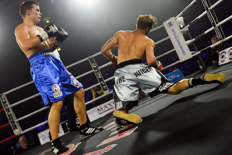 Russian Fedor Chudinov (L) in a fight with Australian Ben Mcculloch. Source: Vladimir Astapkovich / RIA Novosti