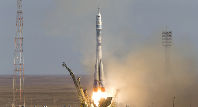 Soyuz-FG rocket booster and Soyuz TMA-11M spaceship launch carrying the Olympic torch on board, at the Baikonur Cosmodrome in Kazakhstan, November 7, 2013. Source: Photoshot / Vostockphoto