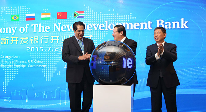 (From left) K.V. Kamath, president of the New Development Bank, Chinese Finance Minister Lou Jiwei and Shanghai Mayor Yang Xiong attend the opening ceremony of the New Development Bank in Shanghai, China, 21 July 2015. Source: AP