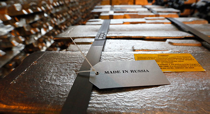 Aluminium ingots with the sign "Made in Russia" are stored at the foundry shop of the Rusal Krasnoyarsk aluminium smelter in the Siberian city of Krasnoyarsk. Source: Ilya Naymushin / Reuters