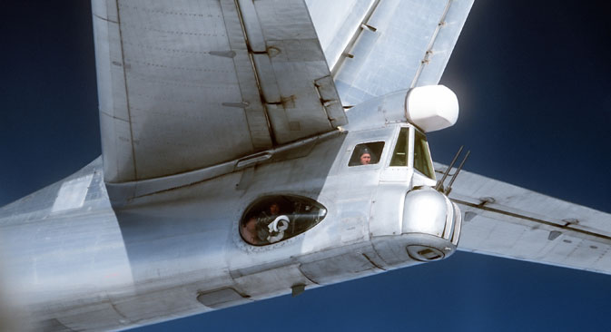A radio-gunner in the Tu-95 Bear strategic bomber cockpit, photographed from an F4D Phantom fighter of the U.S. Air Force, 1980. Source:  USAF