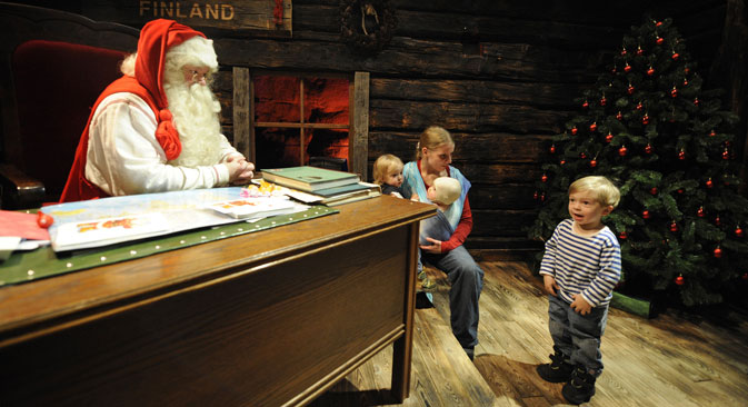 Santa Claus listens to childrens' wish lists', in his "office" in Rovaniemi, Finland. Source: AFP / East News