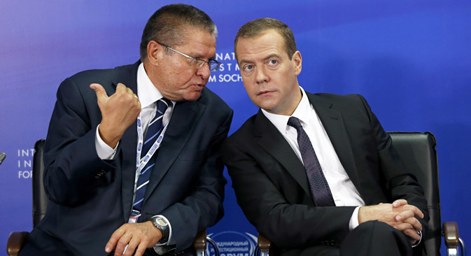 Russian Prime Minister Dmitry Medvedev (right) and Minister of Economic Development of the Russian Federation Alexey Ulyukayev (left) at the Sochi International Economic Forum. Source: Dmitry Astakhov / RIA Novosti