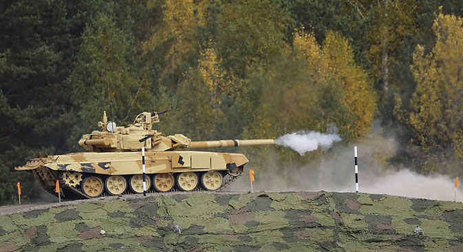 A T-90 tank shoots its cannon during opening of the 10th international exhibition Russia Аrms Еxpo in Nizhny Tagil. Source:  Pavel Lisitsyn / RIA Novosti