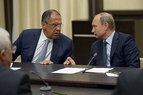 Vladímir Putin junto a Sergey Lavrov. 