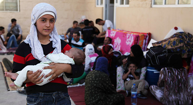 Souvent, ce sont les femmes et les enfants qui ont quitté leur logement et sont devenus réfugiés, alors que les hommes restent pour défendre les lieux qui les ont vu naître ou pour combattre. Crédit : Reuters