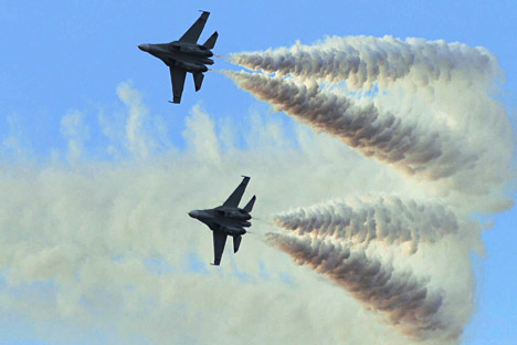 Contratos preveem o fornecimento de 18 caças Sukhoi-30, assim como de peças de reposição e munições para armas ligeiras de fabricação soviética, tanques e peças de artilharia e helicópteros de carga Mi-17 Foto: AP