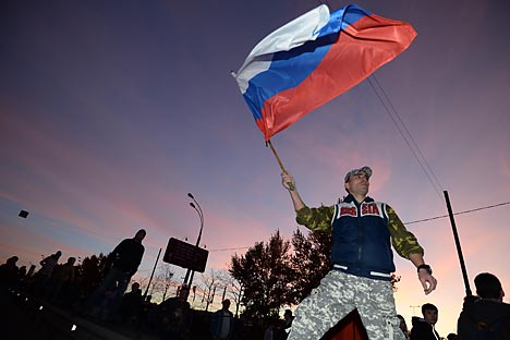 Le nombre de Russes ayant défini le concept de patriotisme comme « l'amour de la patrie » se maintient sous le seuil des 60 %. Crédit : Ramil Sitdikov / RIA Novosti