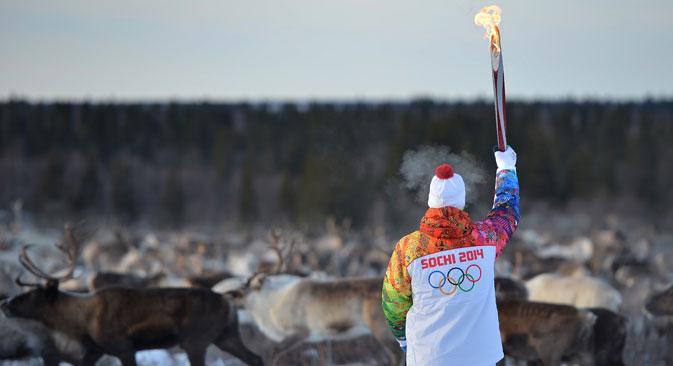 Pour travailler auprès des porteurs de torches olympiques, la rémunération prévue était de 1 500 à 2000$. Crédit : Ramil Sitdikov / RIA Novosti
